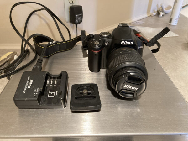 Nikon D3000 Digital Camera And 18-55 mm Lens With Strap Charger And Tripod Mount - Image 2