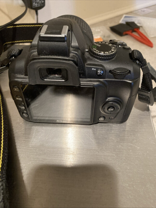 Nikon D3000 Digital Camera And 18-55 mm Lens With Strap Charger And Tripod Mount - Image 4